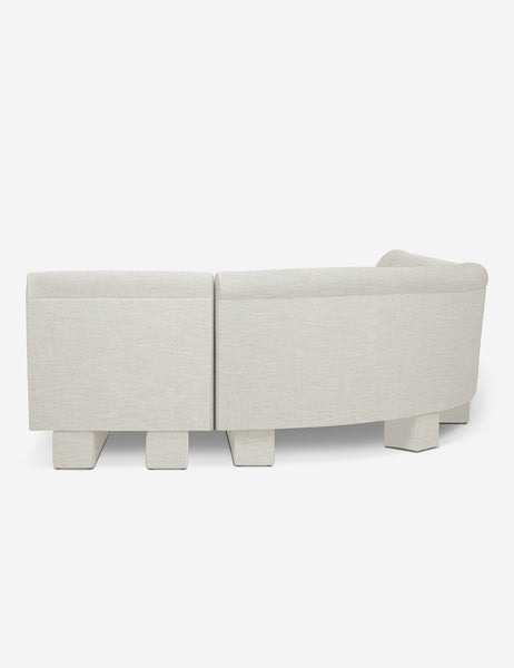 #color::Natural-Linen #configuration::left-facing #size::142-W | Rear view of the side of the Lena natural linen velvet sectional sofa with upholstered beam legs.