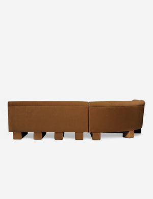 Rear view of the entire Lena left-facing cognac velvet sectional sofa with upholstered beam legs.