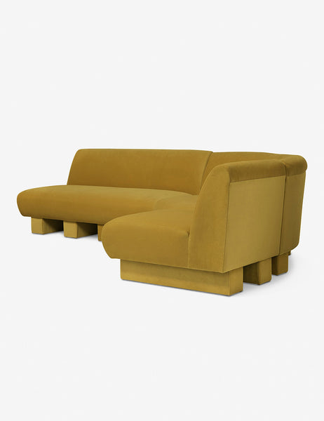 #color::Goldenrod-Velvet #configuration::right-facing #size::114-W | Angled view of the Lena right-facing yellow velvet sectional sofa with upholstered beam legs.