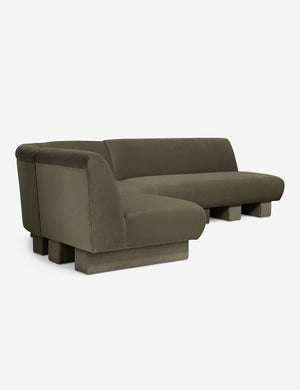 Angled view of the Lena left-facing gray velvet sectional sofa with upholstered beam legs.