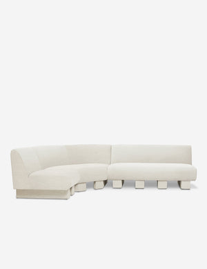 Lena left-facing natural linen sectional sofa with upholstered beam legs.
