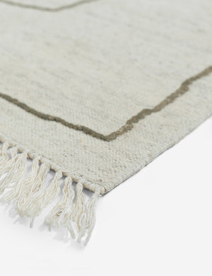 The fringed corner of the Line Drawing Flatweave Rug