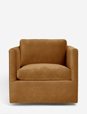 Lotte cognac velvet swivel chair with a deep seat and shelter-style design