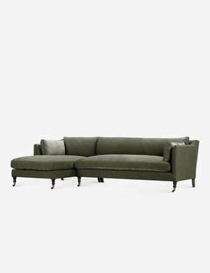 Fabienne left-facing moss velvet sectional with antique curved legs in the back with ornate turned legs in the front with wheels