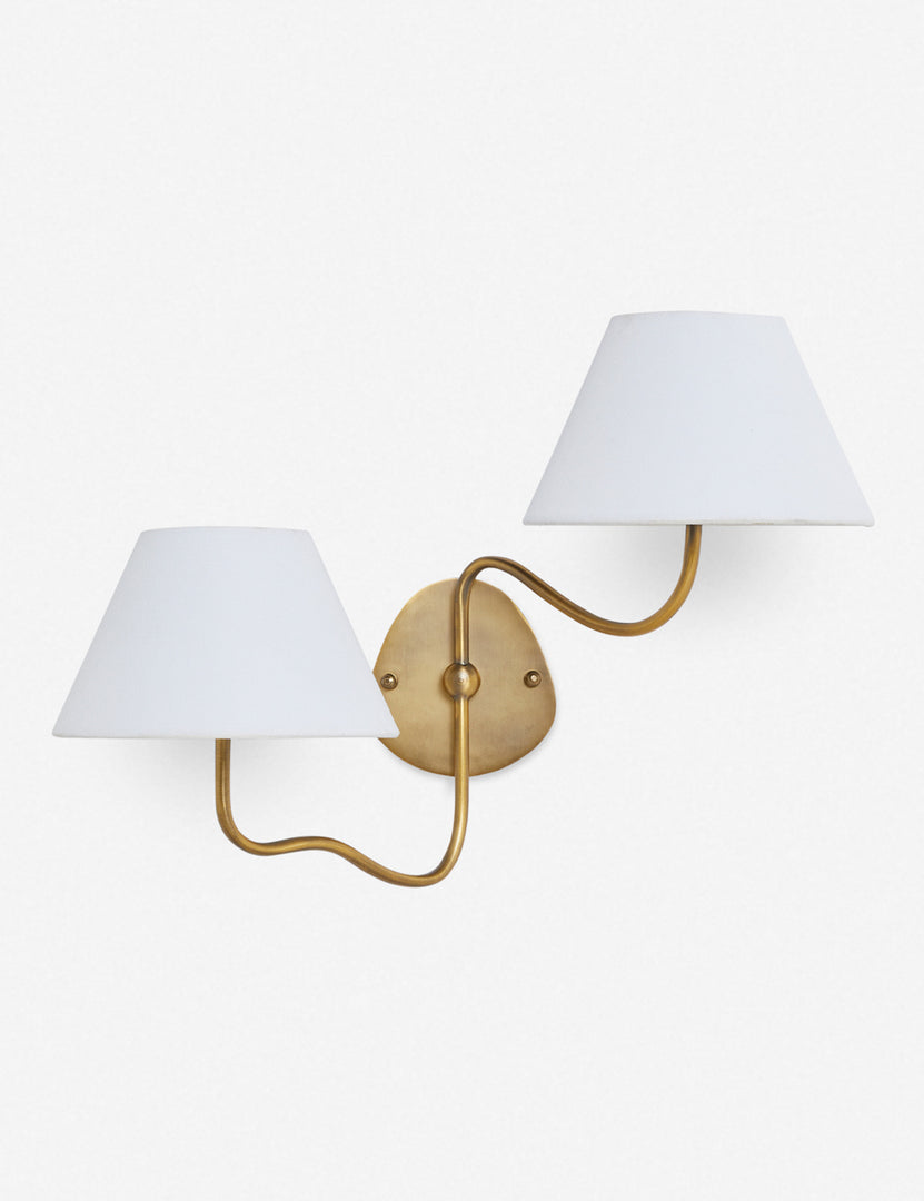 #color::white #finish::brass | Magdalene brass double sconce with a white linen shade, a round wall mount, and an arched arm