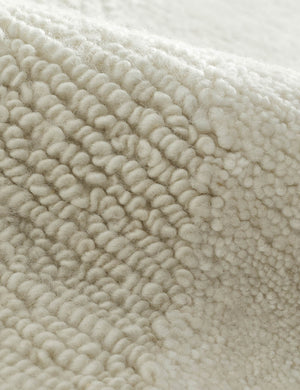 Close-up of the wool blend fabric on the Malin hand-knotted ivory Rug