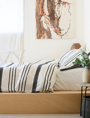 Side view of the Marlo Cotton hand loomed black striped Duvet Set by House No. 23