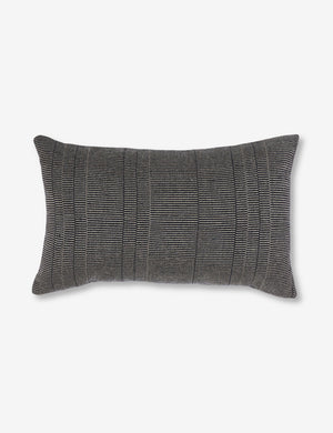 Black Milan indoor and outdoor lumbar pillow with a linear pattern by Sunbrella
