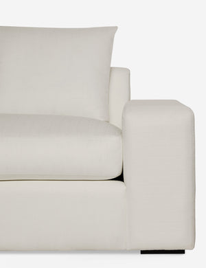 Close-up of the Nadine Ivory performance fabric left-facing sectional sofa