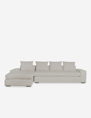 Nadine Natural linen upholstered left-facing sectional sofa with low, wide arms and tall pillow back cushions