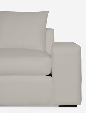 Close-up of the Nadine Natural linen left-facing sectional sofa