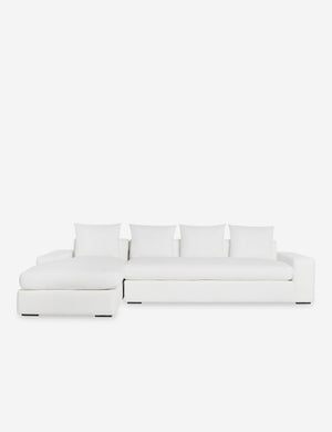 Nadine White performance fabric upholstered left-facing sectional sofa with low, wide arms and tall pillow back cushions