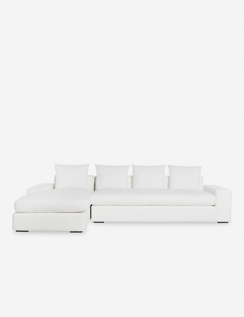 #color::white-performance-fabric #configuration::left-facing | Nadine White performance fabric upholstered left-facing sectional sofa with low, wide arms and tall pillow back cushions