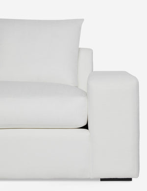 Close-up of the Nadine White performance fabric left-facing sectional sofa