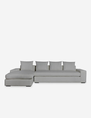 Nadine Gray performance fabric upholstered left-facing sectional sofa with low, wide arms and tall pillow back cushions
