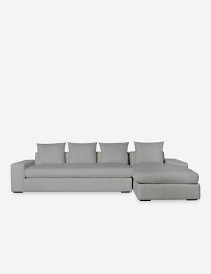 Nadine Gray performance fabric upholstered right-facing sectional sofa with low, wide arms and tall pillow back cushions