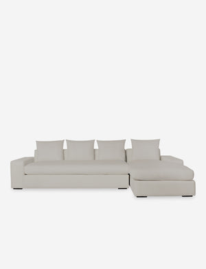 Nadine Natural linen upholstered right-facing sectional sofa with low, wide arms and tall pillow back cushions