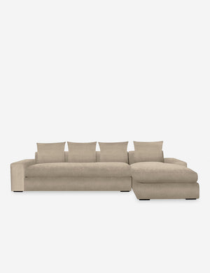 Nadine Oatmeal beige velvet upholstered right-facing sectional sofa with low, wide arms and tall pillow back cushions