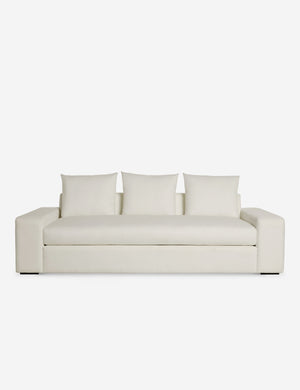 Nadine ivory performance fabric sofa with low, wide arms and tall pillow back cushions