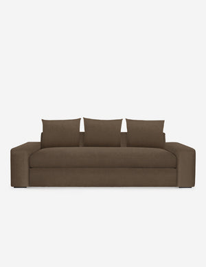 Nadine toffee brown velvet sofa with low, wide arms and tall pillow back cushions