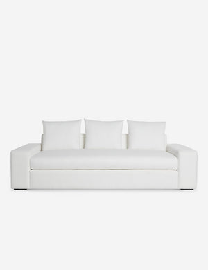 Nadine white performance fabric sofa with low, wide arms and tall pillow back cushions