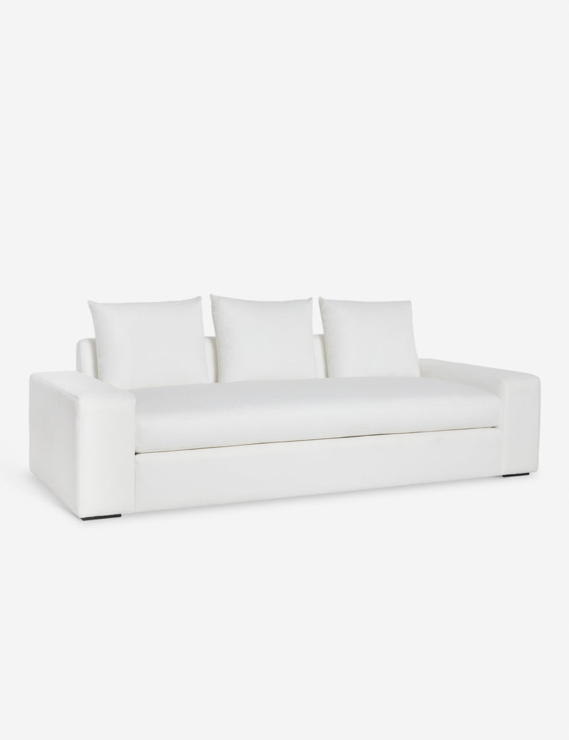 #color::white-performance-fabric #size::108-W #size::96-W #size::84-W | Angled view of the Nadine white performance fabric sofa