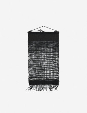 Nyana black jute wall hanging with a fringed bottom