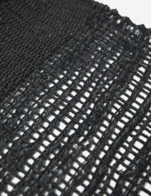 Close up of the Nyana black wall hanging