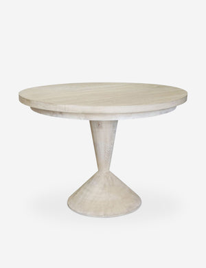 Oda White Round Dining Table with a geometric base