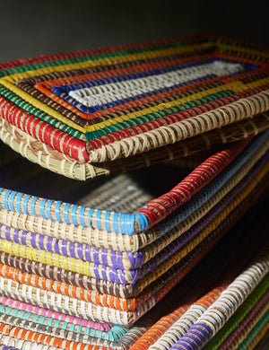 Close up of the Olie Rainbow Woven Lidded Baskets (Set of 2) by Expedition Subsahara made with elephant grass