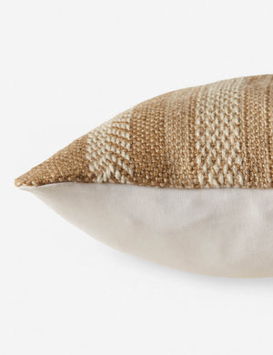 Close up side view of the kamala indoor and outdoor lumbar throw pillow with bohemian accents in natural