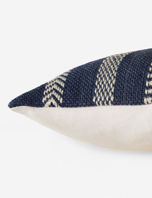 Close up side view of the kamala indoor and outdoor lumbar throw pillow with bohemian accents in blue