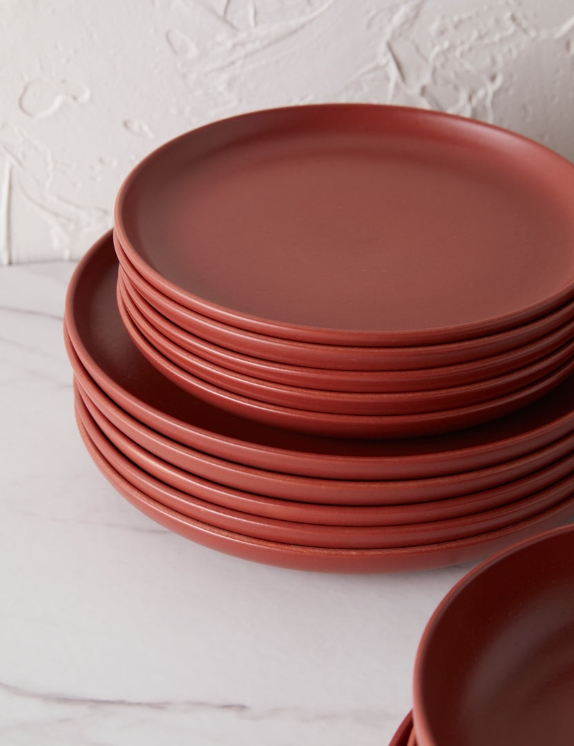 #color::cayenne | All of the plates that are part of the Cayenne red Pacifica Dinnerware (18-Piece Set) by Casafina stacked
