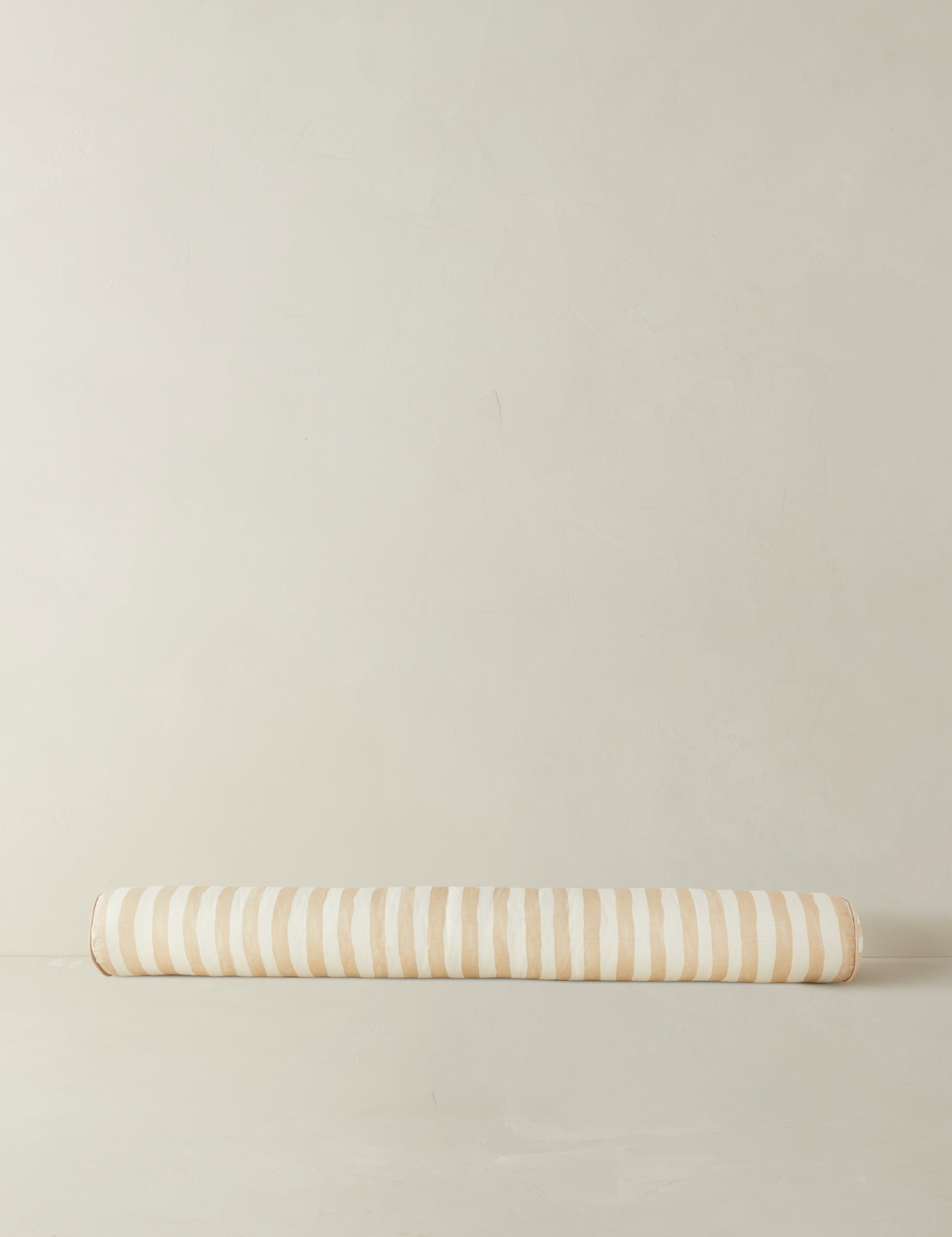 #color::natural-and-ivory | Painterly stripe linen long bolster throw pillow in natural and ivory