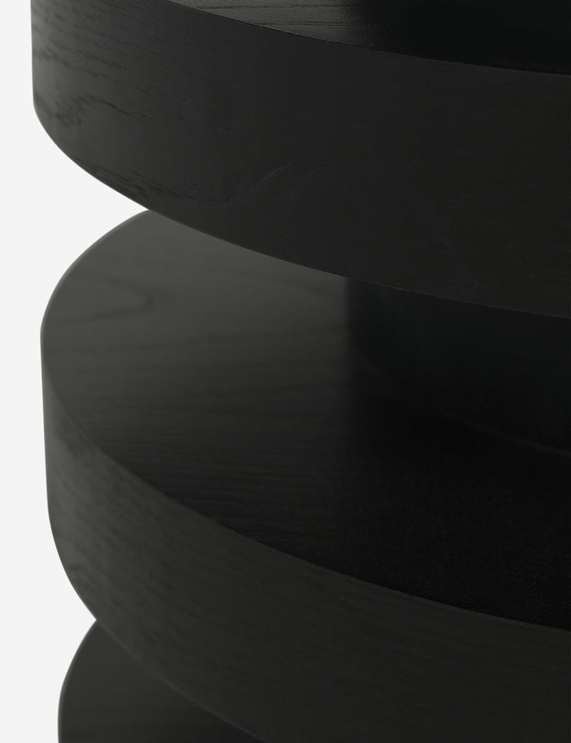 #color::black | Close-up of the Pentwater Four-Tiered Black Round Side Table