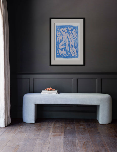 #size::8--x-12- #size::16--x-24- #size::20--x-30- #size::255--x-355- #size::30--x-45- #size::135--x-175- #size::215--x-295- #size::355--x-505- #color:black #frame-option::framed | The Picnic Print in a silver frame in a black frame hangs on a black wall above a light blue velvet bench
