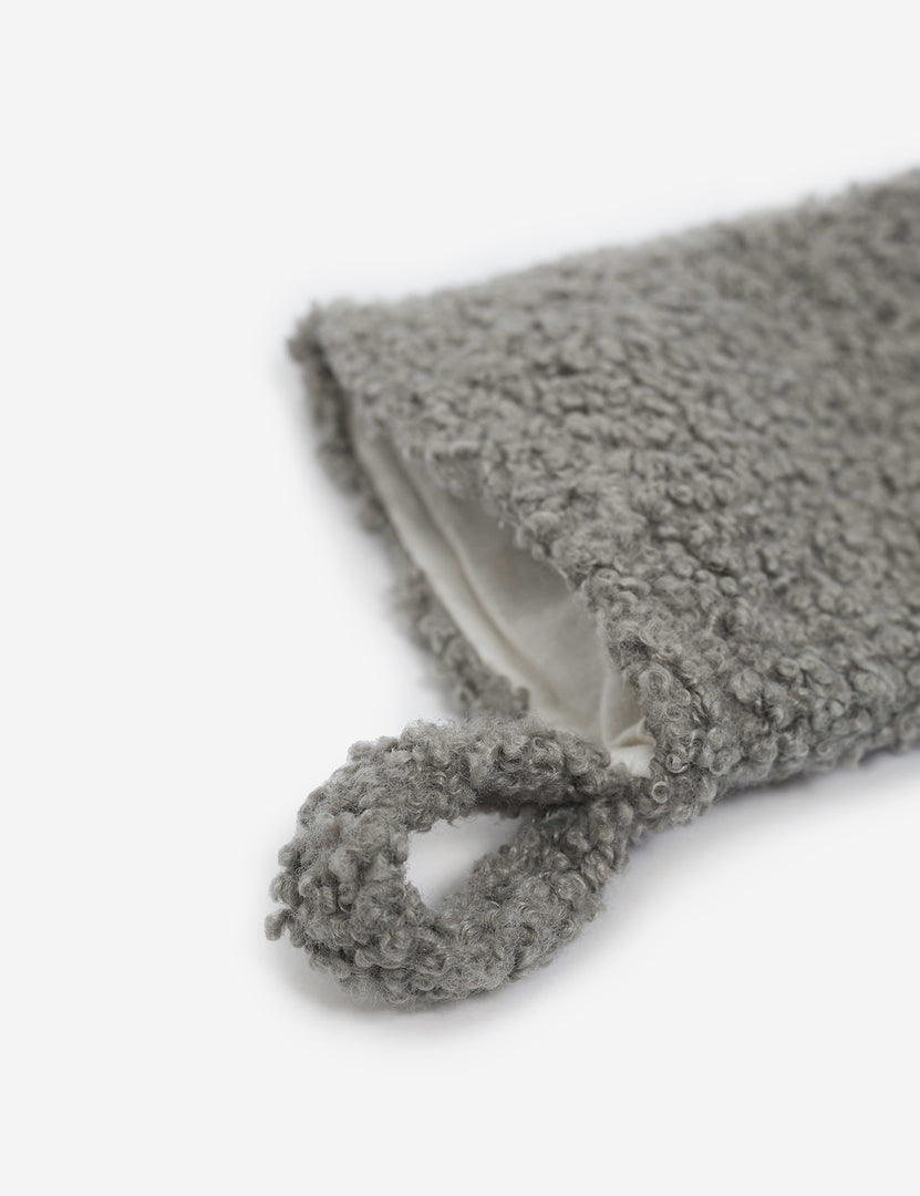 #color::pewter | Close up of the hanging loop at the top of the Olya Pewter Gray Plush Stocking