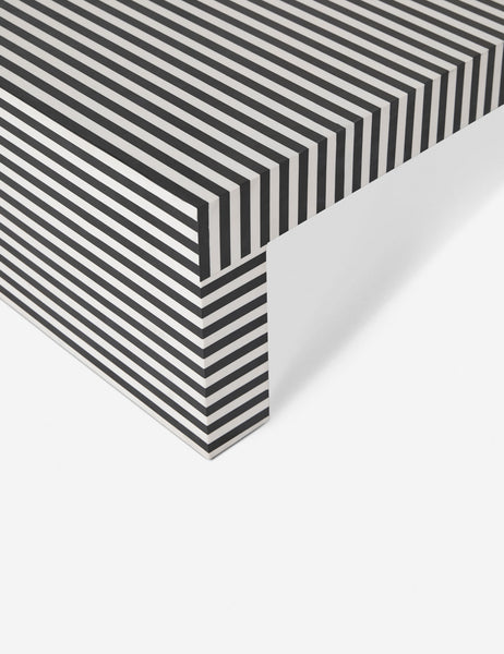 | Upward view of the corner of the Prado black and white striped coffee table 