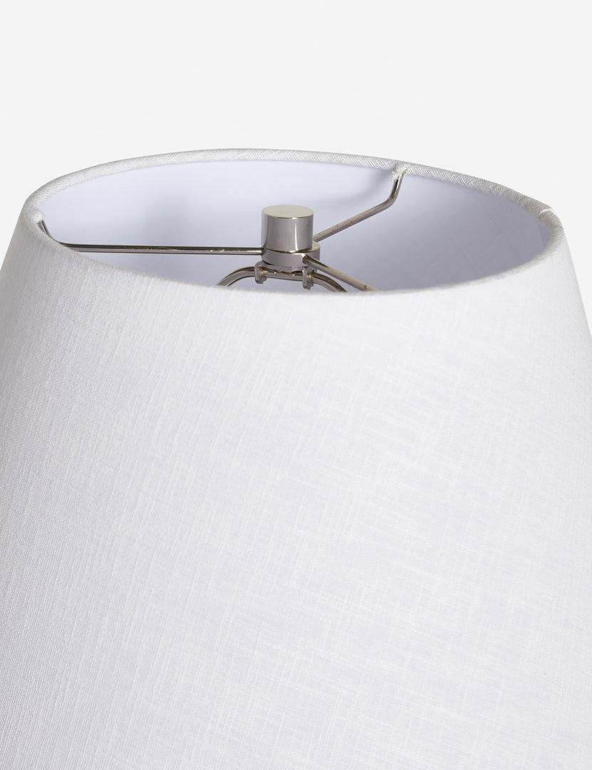 #color::black | The silver hardware and white linen shade on the top of the Pratt black table lamp