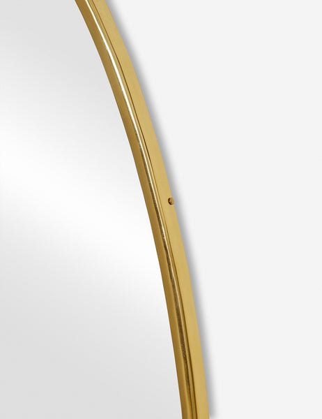 #size::large | The gold curved frame on the large puddle mirror