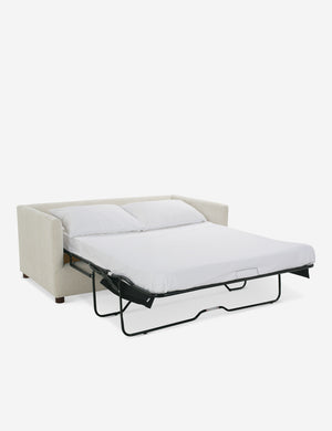 Lotte White Basketweave queen-sized sleeper sofa with the bed pulled out