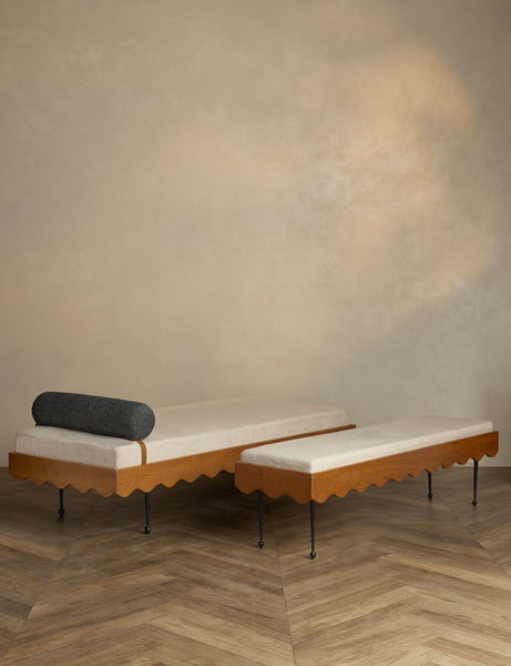 | The Rise Daybed sits in a studio room with the Rise Bench
