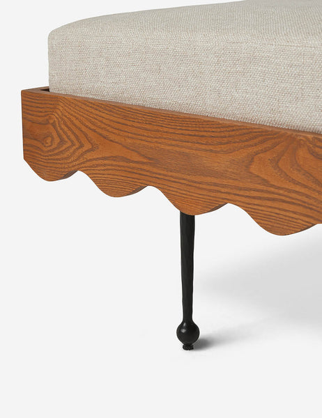 | Wood scallop detailing and spindle legs on the corner of the Rise Daybed