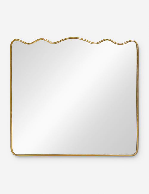 | Rook mantel mirror with a gold frame and a wavy silhouette by Sarah Sherman Samuel