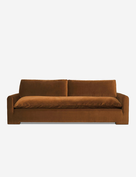 #color::Cognac-Velvet #size::102-W | Rupert cognac velvet sofa with an elevated frame and plush cushions by Sarah Sherman Samuel