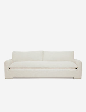 Rupert Natural Linen sofa with an elevated frame and plush cushions by Sarah Sherman Samuel