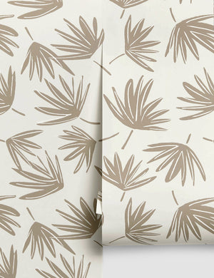 Palms ivory wallpaper featuring a brown botanical motif by Rylee + Cru