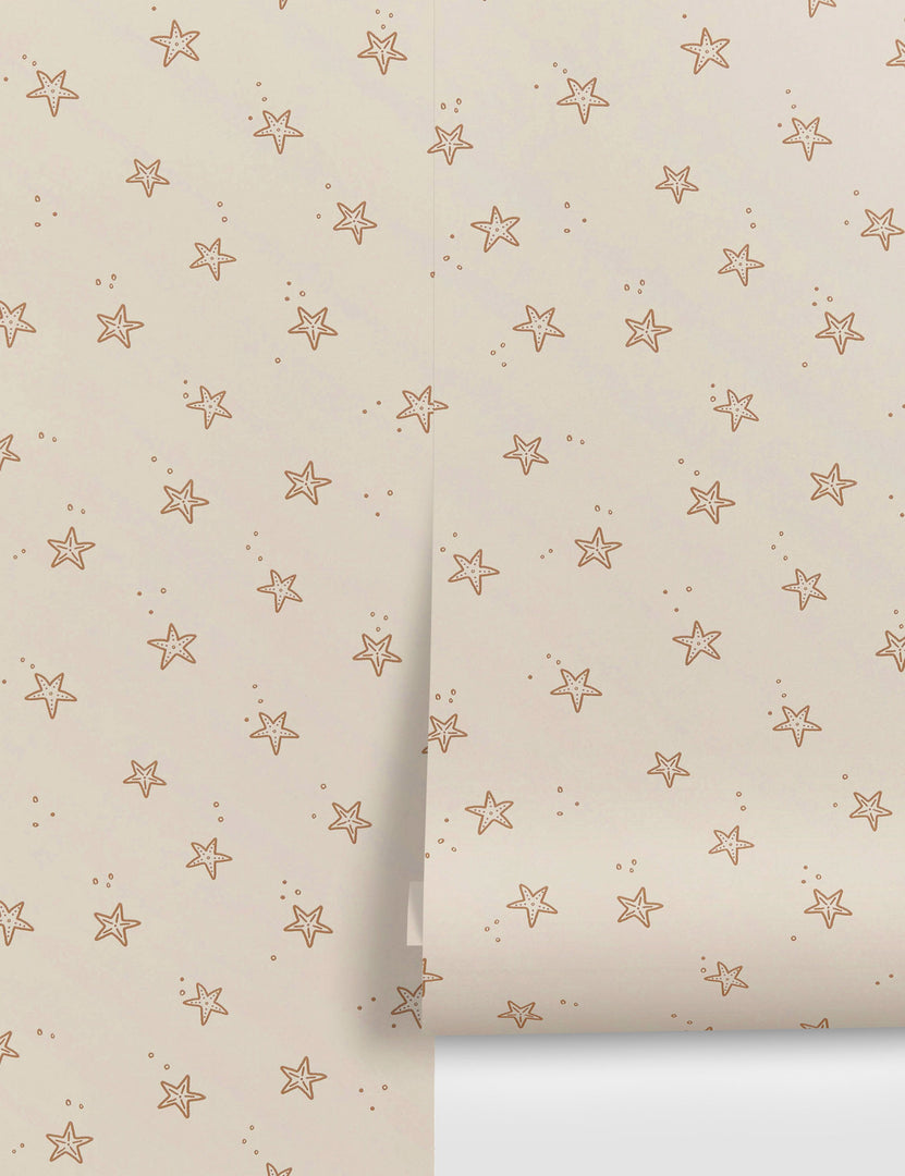 | Starfish cream and orange wallpaper by Rylee + Cru