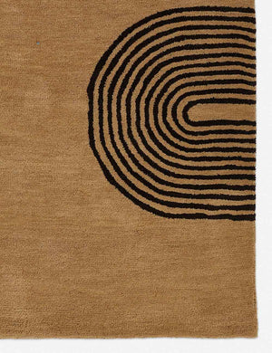 Close-up of the black abstract linear design on the Laci natural rug