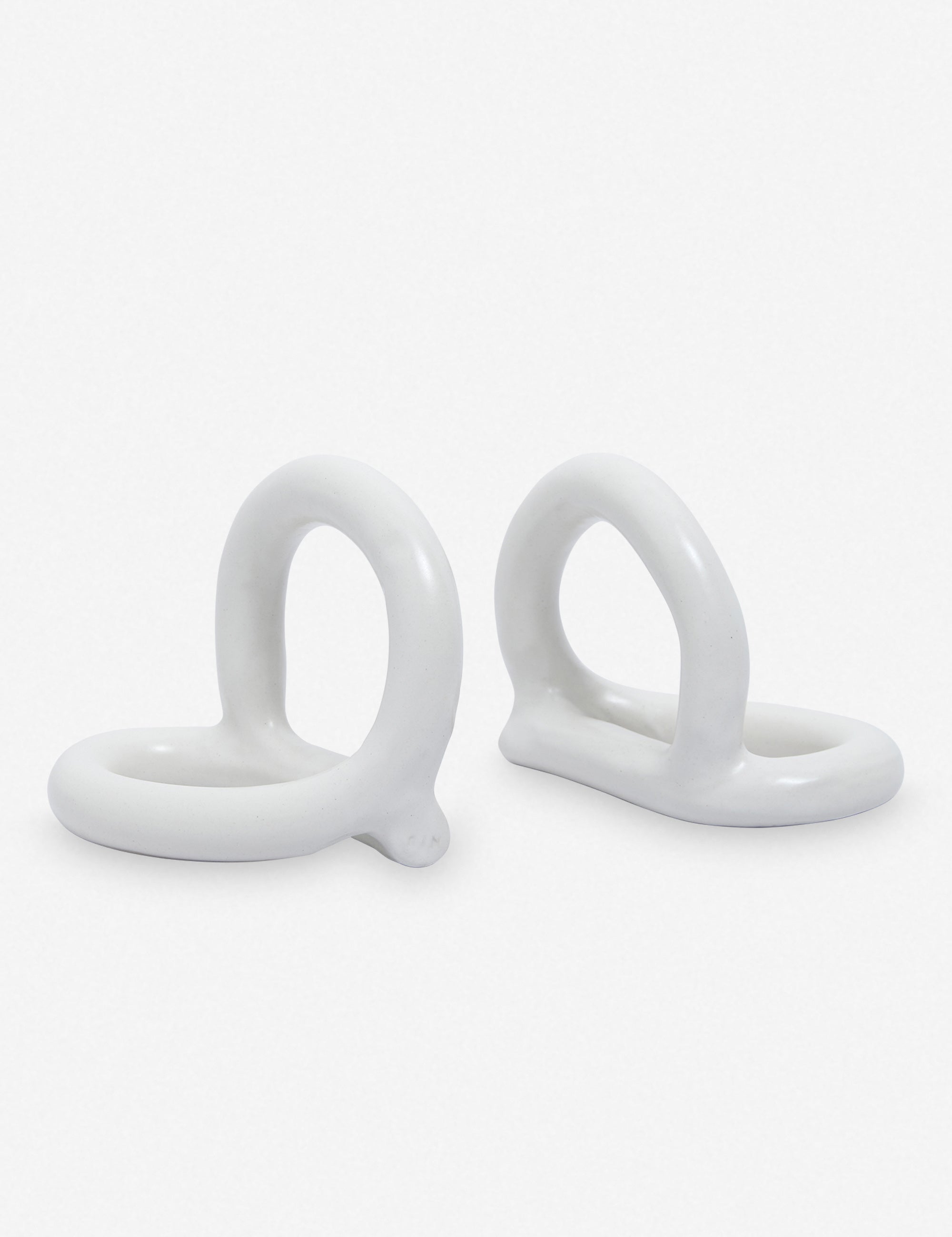 #color::cream | Bacchus white ceramic bookends by sin
